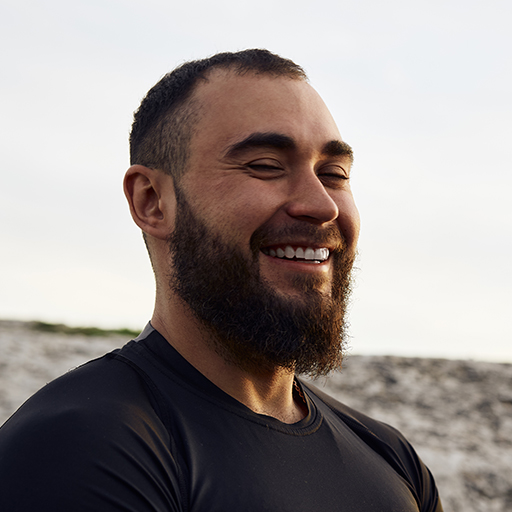young-bearded-man-portrait-outdoors-in-the-mountai-6Z46ZMB.jpg